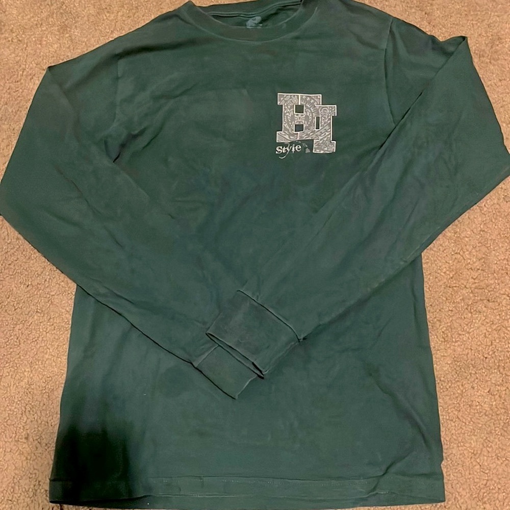 Long sleeve dark green shirt, small stain on front side, a little worn in.